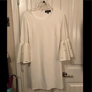 White belle sleeve dress